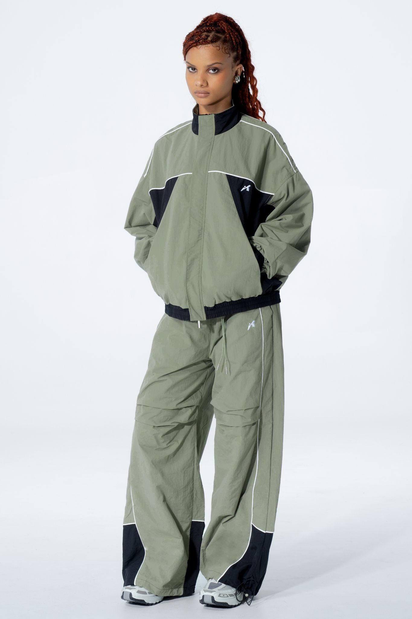 
                  
                    Astra Track Pants
                  
                